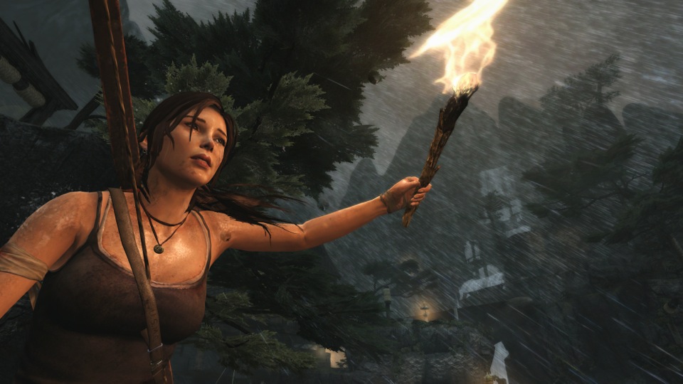 Lara ilumina o caminho por uma vila da montanha em ruínas.