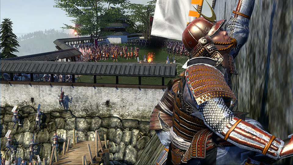 Vor einer belagerten Festung starten die angreifenden Samurai einen wagemutigen Versuch, die Wände zu erklimmen.
