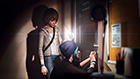 Max stands by as Chloe expertly picks the lock to the principal’s office.